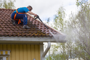 How Roof Cleaning Can Extend the Lifespan of a Metal Roof